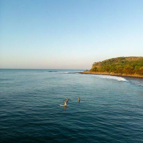 surfing in evening at puro surf