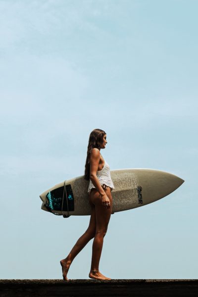 girl having surfing board